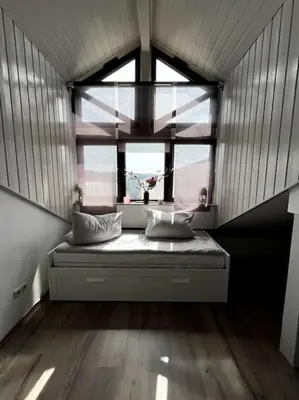 Ein Bett oder Betten in einem Zimmer der Unterkunft Moderne Wohnung mit Dachterrasse