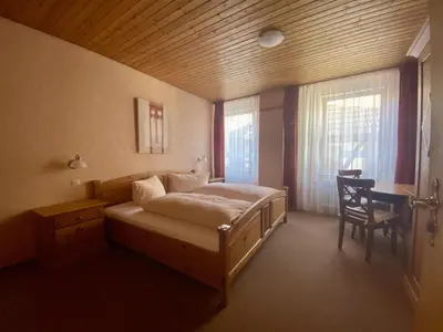 Ein Bett oder Betten in einem Zimmer der Unterkunft Pension Walther