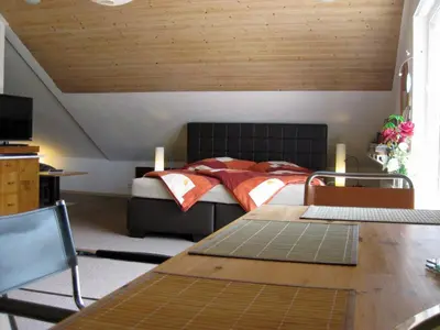 Ein Bett oder Betten in einem Zimmer der Unterkunft Eva und Wolf Apartments