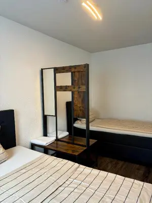 Ein Bett oder Betten in einem Zimmer der Unterkunft SiYen two with 24h Check-in