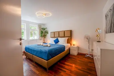 Ein Bett oder Betten in einem Zimmer der Unterkunft SCHLOSSBERG RESIDENCES - Markplatz City-Apartment