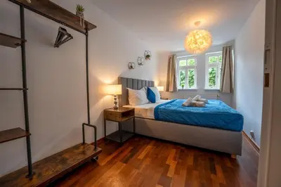 Ein Bett oder Betten in einem Zimmer der Unterkunft SCHLOSSBERG RESIDENCES - Markplatz City-Apartment
