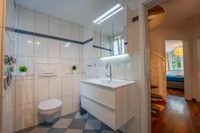 Ein Badezimmer in der Unterkunft SCHLOSSBERG RESIDENCES - Markplatz City-Apartment