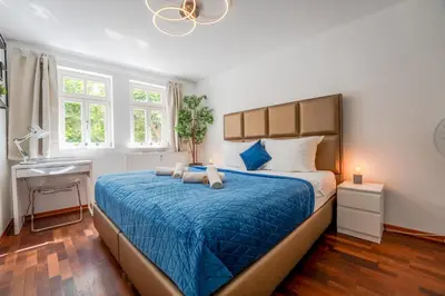 Ein Bett oder Betten in einem Zimmer der Unterkunft SCHLOSSBERG RESIDENCES - Markplatz City-Apartment