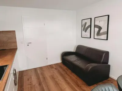 Ein Sitzbereich in der Unterkunft Melem Apartments