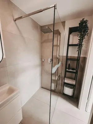 Ein Badezimmer in der Unterkunft Melem Apartments
