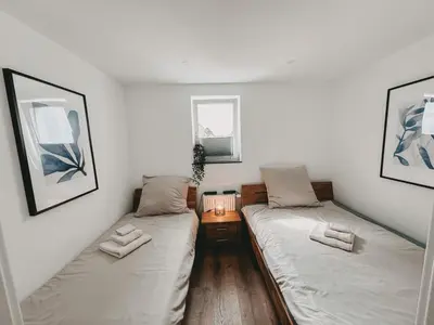 Ein Bett oder Betten in einem Zimmer der Unterkunft Melem Apartments