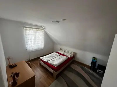 Ein Bett oder Betten in einem Zimmer der Unterkunft Comfort Apartments Heilbronn