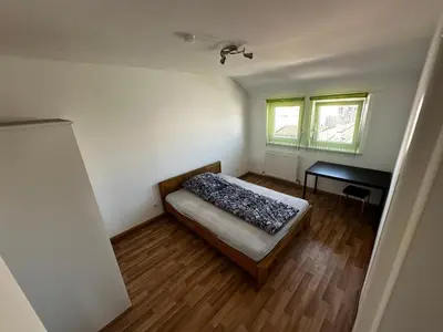Ein Bett oder Betten in einem Zimmer der Unterkunft Comfort Apartments Heilbronn