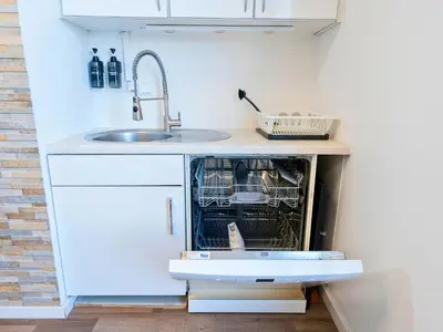 Küche/Küchenzeile in der Unterkunft Design Penthouse - 4SZ - 2Bäder - Whirlpool - 2 Parkplätze - Dachterrasse