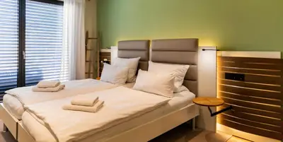 Ein Bett oder Betten in einem Zimmer der Unterkunft vineLodge L