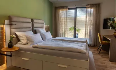 Ein Bett oder Betten in einem Zimmer der Unterkunft vineLodge L