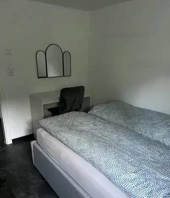 Ein Bett oder Betten in einem Zimmer der Unterkunft Gemütlich Wohnen Sinsheim 2