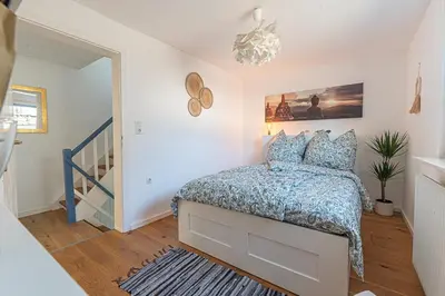 Ein Bett oder Betten in einem Zimmer der Unterkunft FeWo Birdflower