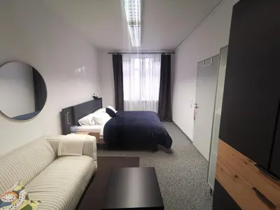 Ein Bett oder Betten in einem Zimmer der Unterkunft Stadtwohnung Miltenberg Perle am Main