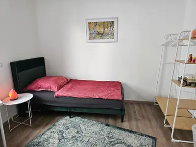 Ein Bett oder Betten in einem Zimmer der Unterkunft Moderne Doppelhaushälfte in Oppenheim