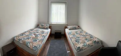 Ein Bett oder Betten in einem Zimmer der Unterkunft Ferienwohnung Grimm 3