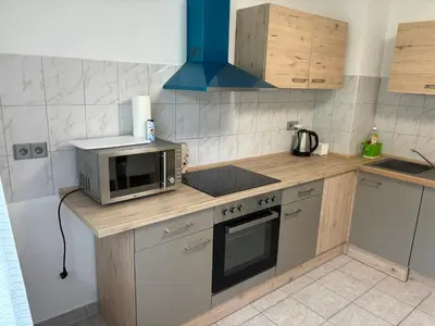 Küche/Küchenzeile in der Unterkunft Ferienwohnung Grimm 3