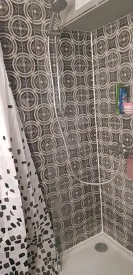 Ein Badezimmer in der Unterkunft Hotel Adriana