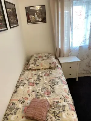 Ein Bett oder Betten in einem Zimmer der Unterkunft Hotel Adriana