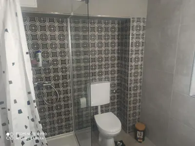 Ein Badezimmer in der Unterkunft Hotel Adriana