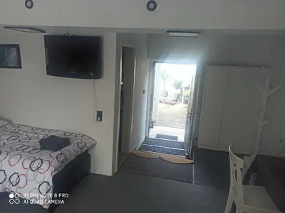Ein Bett oder Betten in einem Zimmer der Unterkunft Hotel Adriana
