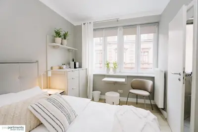 Ein Bett oder Betten in einem Zimmer der Unterkunft YOUPARTMENTS - zentrale Micro Apartments
