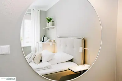 Ein Bett oder Betten in einem Zimmer der Unterkunft YOUPARTMENTS - zentrale Micro Apartments