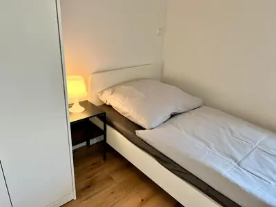 Ein Bett oder Betten in einem Zimmer der Unterkunft Monteur- und Ferienwohnung Lingenfeld