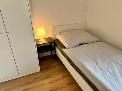 Ein Bett oder Betten in einem Zimmer der Unterkunft Monteur- und Ferienwohnung Lingenfeld
