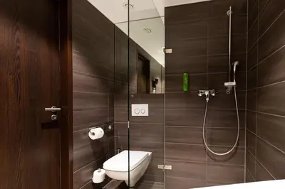 Ein Badezimmer in der Unterkunft Tobbaccon Hotel
