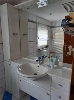 Ein Badezimmer in der Unterkunft Gemütliches Häuschen