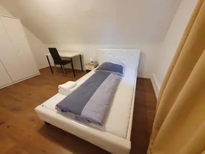 Ein Bett oder Betten in einem Zimmer der Unterkunft Privates Einzelzimmer direkt an der Uniklinik Mainz