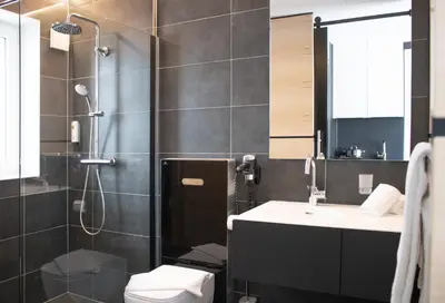 Ein Badezimmer in der Unterkunft LPH Hotel by WMM Hotels