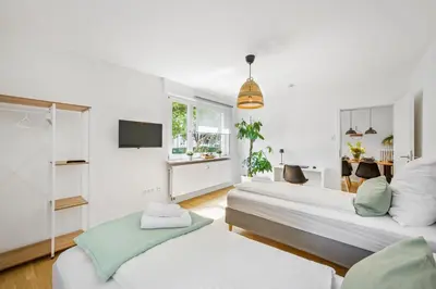 Ein Bett oder Betten in einem Zimmer der Unterkunft Ferienwohnung Neckarblick Heilbronn