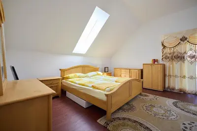 Ein Bett oder Betten in einem Zimmer der Unterkunft Ferienhaus SWD