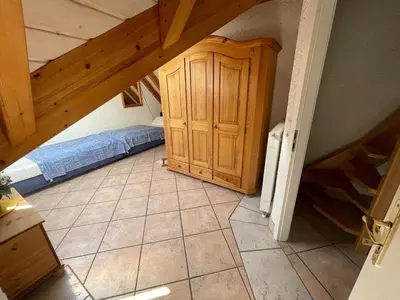 Ein Bett oder Betten in einem Zimmer der Unterkunft Glattbacher Hof Ferienwohnung 9