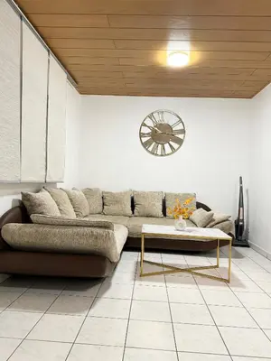 Ein Sitzbereich in der Unterkunft Neu renovierte Ferienwohnung mit Terrasse & schnellem WLAN im Odenwald