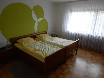 Ein Bett oder Betten in einem Zimmer der Unterkunft Ferienwohnung Abendsonne