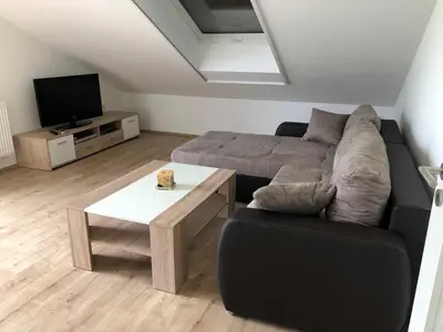 Ein Sitzbereich in der Unterkunft Ferienwohnung Zum Eduardstal