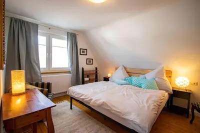 Ein Bett oder Betten in einem Zimmer der Unterkunft Paulas Ferienhaus