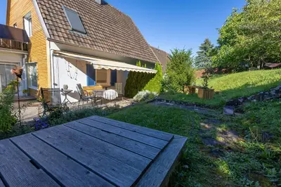 Ein Garten an der Unterkunft Paulas Ferienhaus