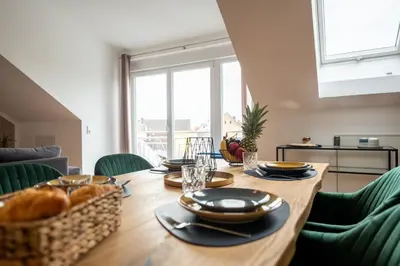 Ein Sitzbereich in der Unterkunft SCHLOSSBERG RESIDENCES - Design City-Apartment Nähe SAP und Hockenheimring
