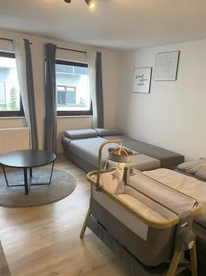 Ein Sitzbereich in der Unterkunft Ferienwohnung S19 - City-Apartment 33
