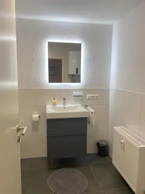 Ein Badezimmer in der Unterkunft Ferienwohnung S19 - City-Apartment 33