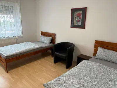 Ein Bett oder Betten in einem Zimmer der Unterkunft Ferienwohnung Grimm 2