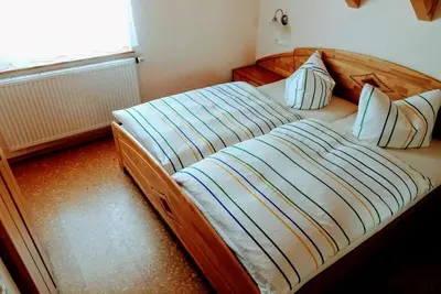Ein Bett oder Betten in einem Zimmer der Unterkunft Ferienwohnung Sartorius