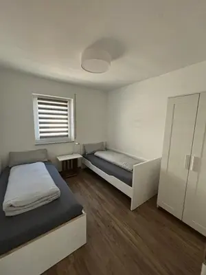 Ein Bett oder Betten in einem Zimmer der Unterkunft Ferienwohnung Gergert Nr 5
