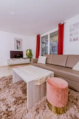 Ein Sitzbereich in der Unterkunft Stylishes Apartement Poststraße 36