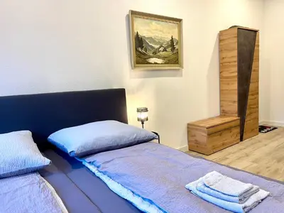 Ein Bett oder Betten in einem Zimmer der Unterkunft Black Forest Apartament Schlössle Goldstadt Pforzheim Schwarzwald